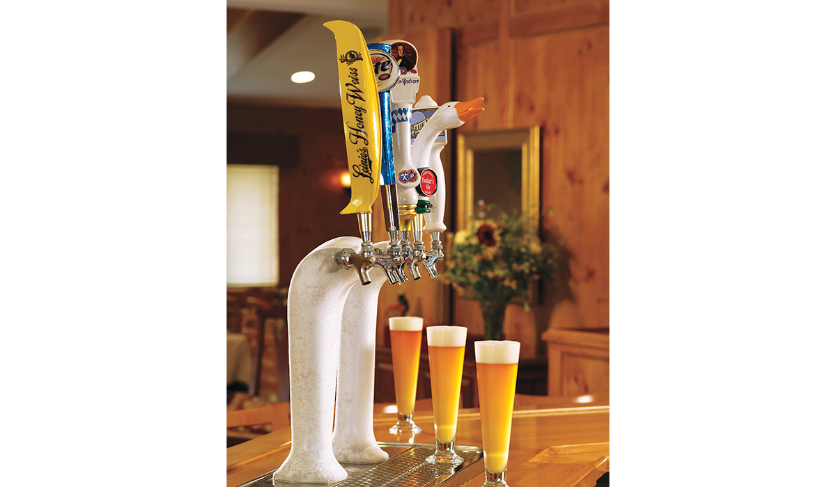 A fully appointed bar serving premium beverages and perfectly chilled draft beer.