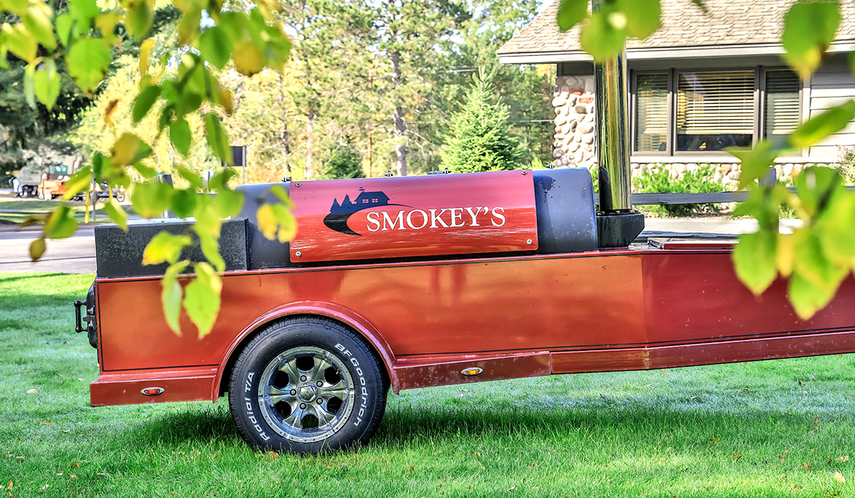 Smokey's iconic Jambo Pits smoker was custom-made in Texas.
